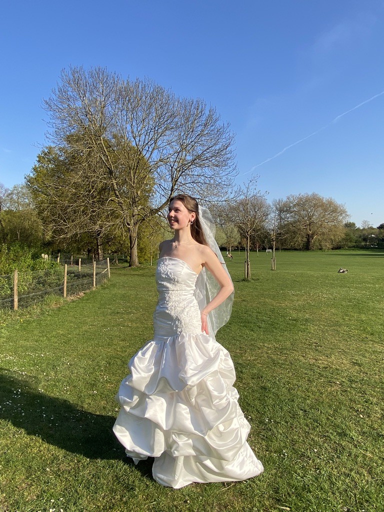Yvie Apps modelling a wedding dress she designed and made.
